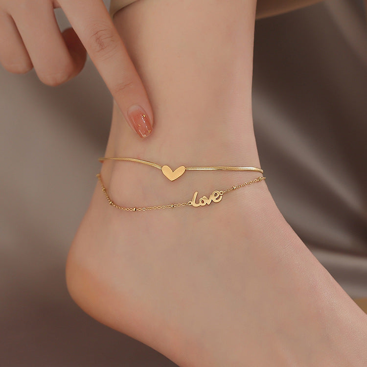 Tobillera de Monedas Minimalista de Doble Capa para Mujer en Acero de Titanio con Chapado en Oro de 18K, Diseño en Forma de Corazón