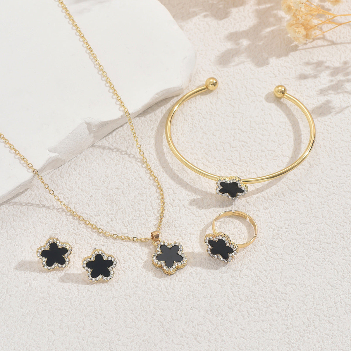 Elegant Plum Blossom Design Alloy Necklace Bracelet Earrings and Ring Set with Rhinestone Inlay for Women