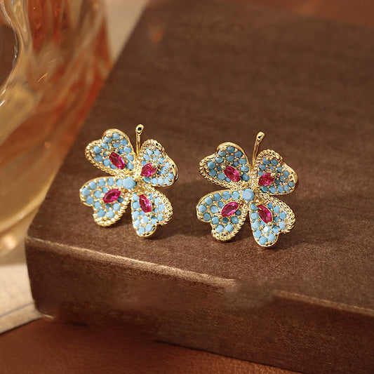Pendientes de botón florales de estilo vintage con incrustaciones de diamantes de imitación en base de aleación y postes de acero inoxidable para mujer