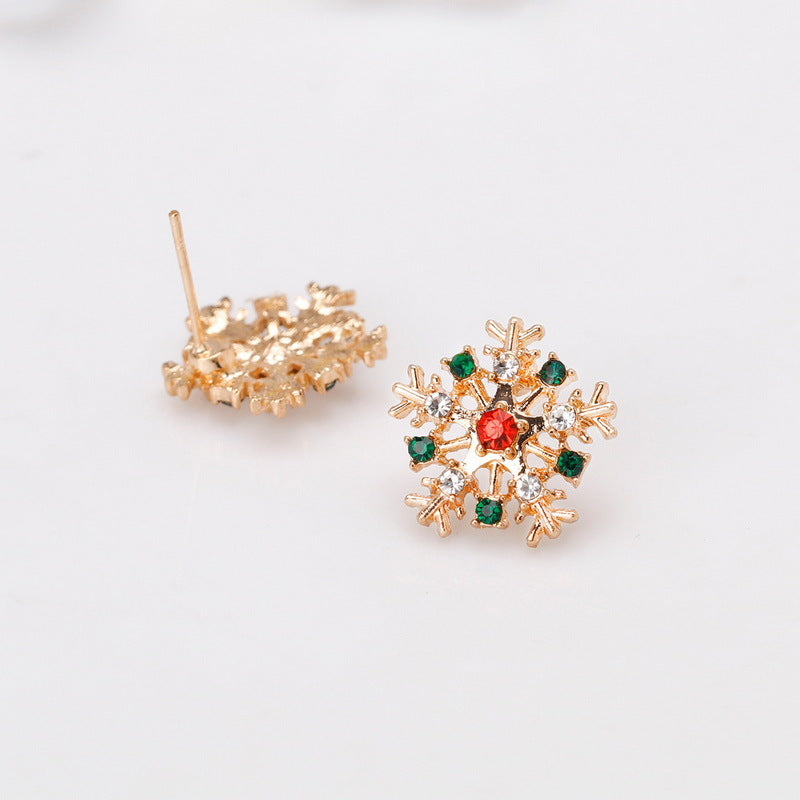 Pendientes de copo de nieve navideños de moda para mujer con incrustaciones de diamantes de imitación y baño de oro en forma geométrica