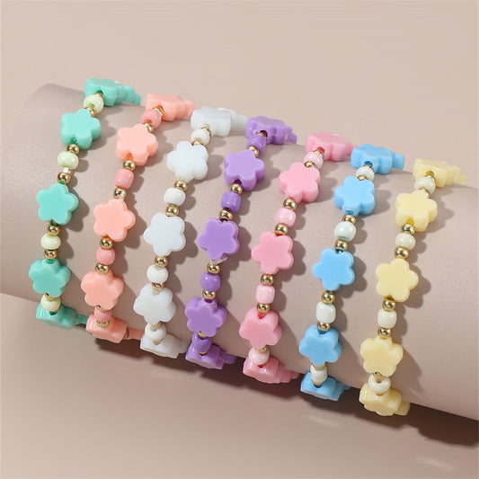 Braccialetto Minimalista a Stella con Perline per Bambini Realizzato in Plastica e Resina con Accenti Floreali Colorati