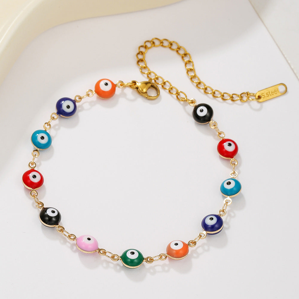 Cavigliera e braccialetto in acciaio inossidabile in stile bohémien colorato con occhio di Allah e motivi geometrici e a cuore