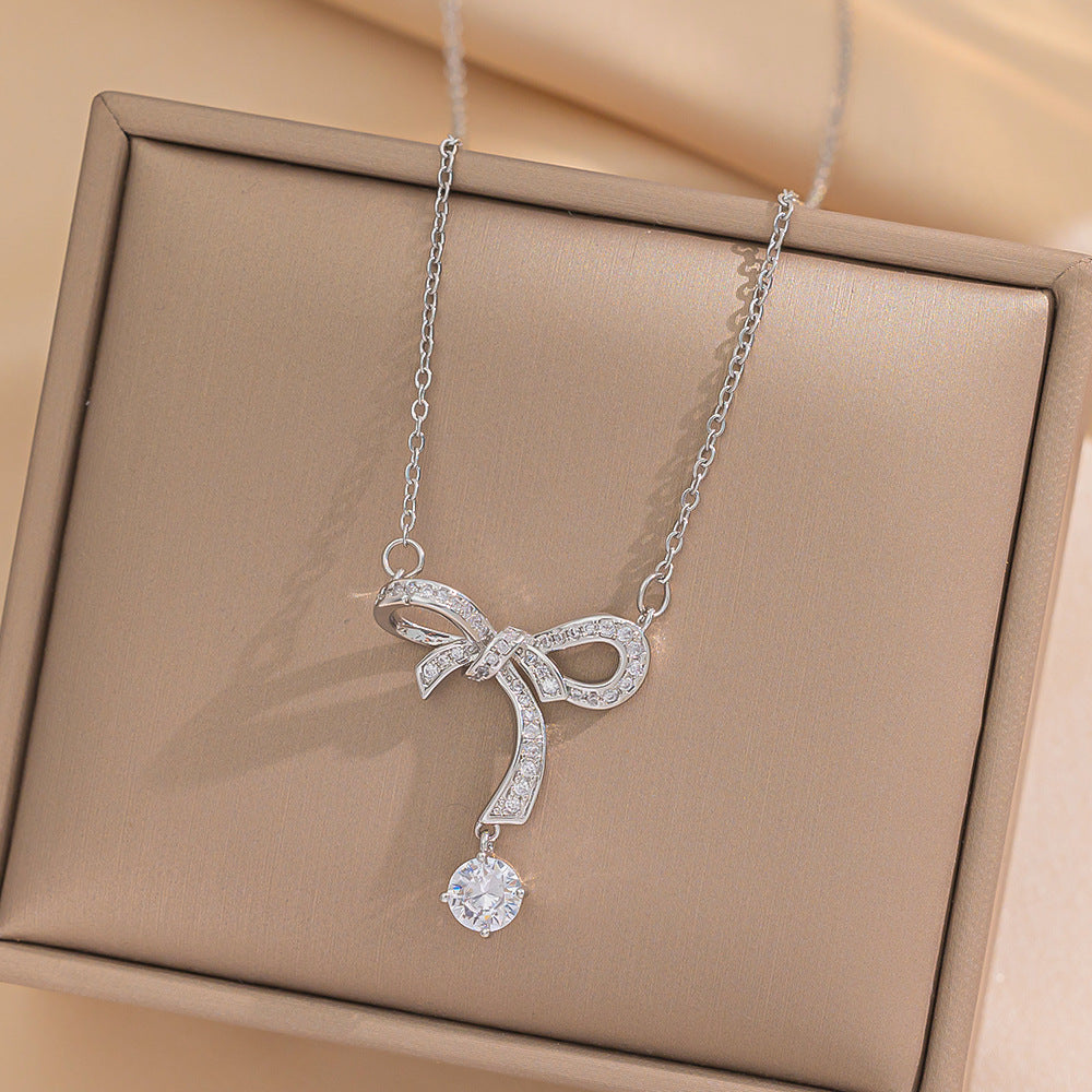 Minimalist Geometric Bowknot Pendant Necklace for Women in Titanium Steel with Rhinestone Inlay and Electroplated Finish on Snake Chain