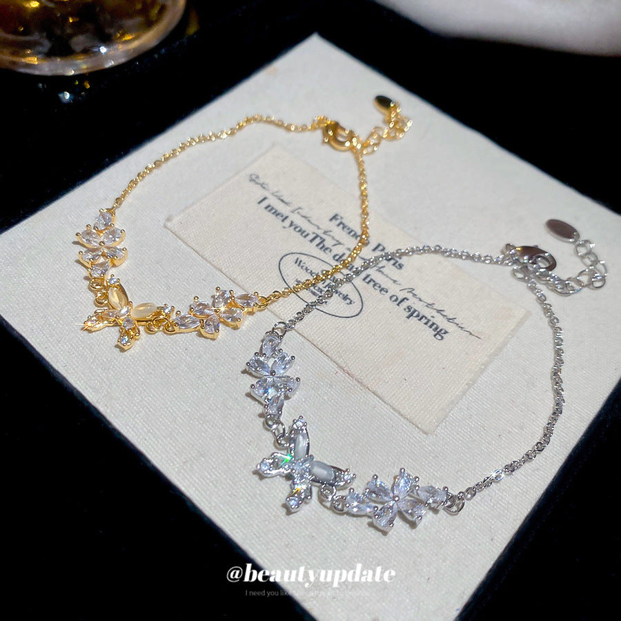Bracciale da donna placcato oro 18 carati con zirconi a forma di farfalla in stile lusso