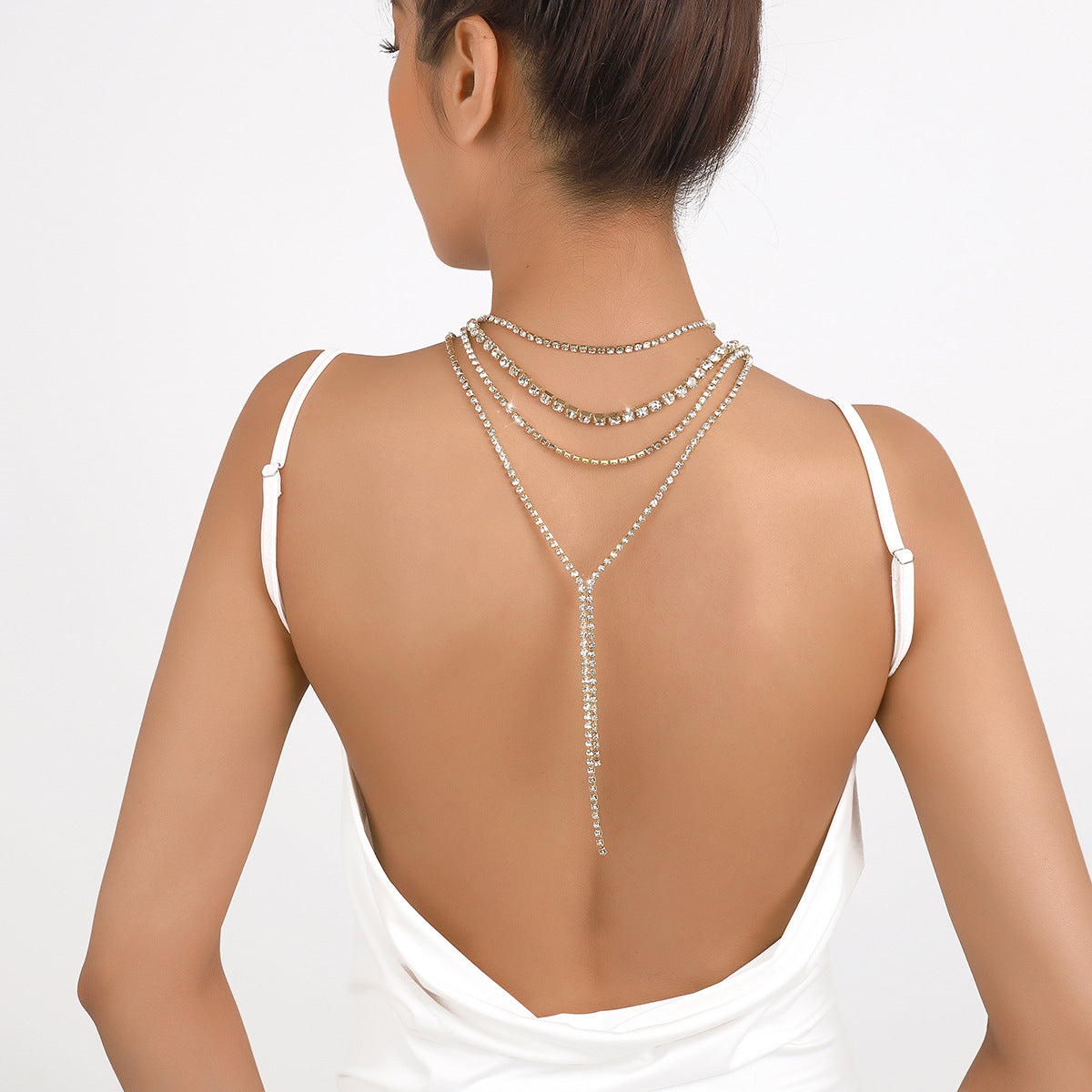 Collar de colgante geométrico de diamantes de imitación dulce y atrevido con diseño de borla multicapa chapado para mujer