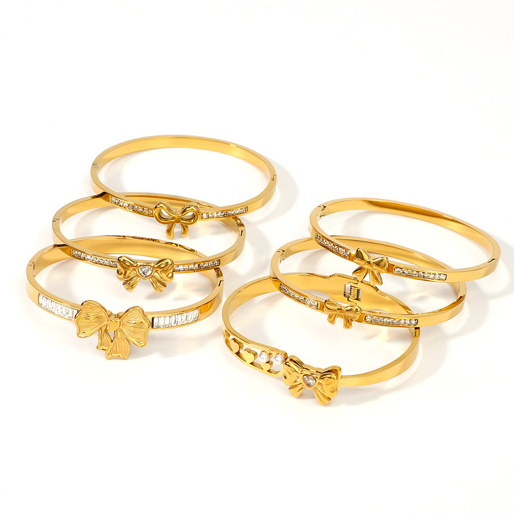 Asymmetrical Bow-Shaped Stainless Steel Bracelet for Women with Zircon Inlay and 18K Gold Plating