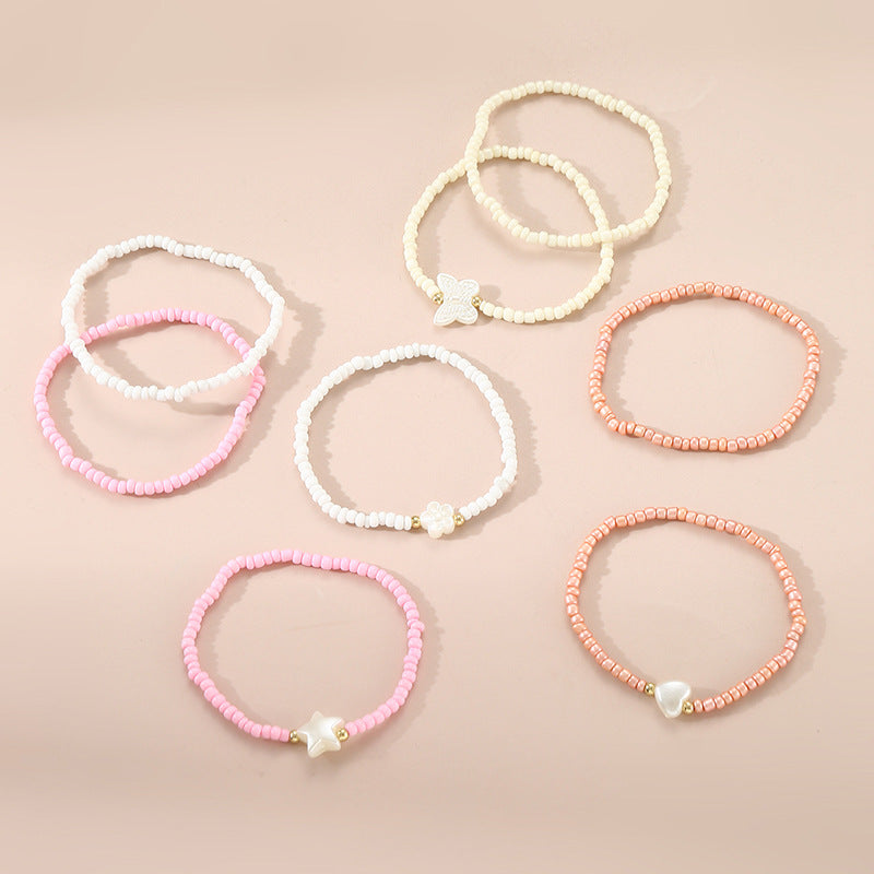 Braccialetto artigianale in stile bohémien con perline per bambini con ciondoli a forma di stella e cuore, perline di vetro colorate