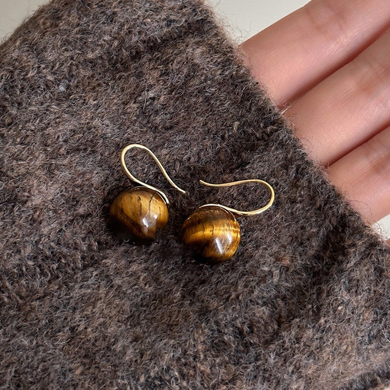 Pendientes de botón de acero chapado de estilo lujoso con perlas de imitación y detalles de ojo de tigre con diseño floral para mujer