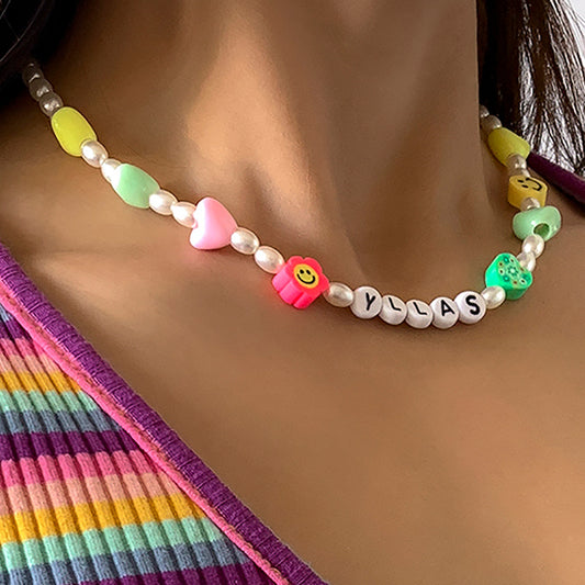 Minimalist Geometric Pearl-Style Letter Necklace with Floral and Heart Accents for Women