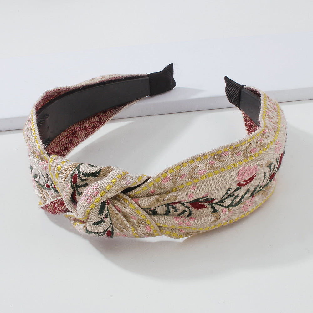 Diadema minimalista de tela para mujer con motivo floral y de hojas bordado