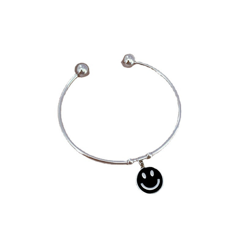 Bracciale Minimalista in Acciaio al Titanio con Faccina Sorridente in Madreperla e Finitura Placcata