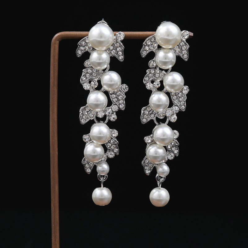 Minimalist Leaf-Shaped Alloy Earrings with Plated Finish for Women Elegant Pearl Drop Design Fashion Jewelry