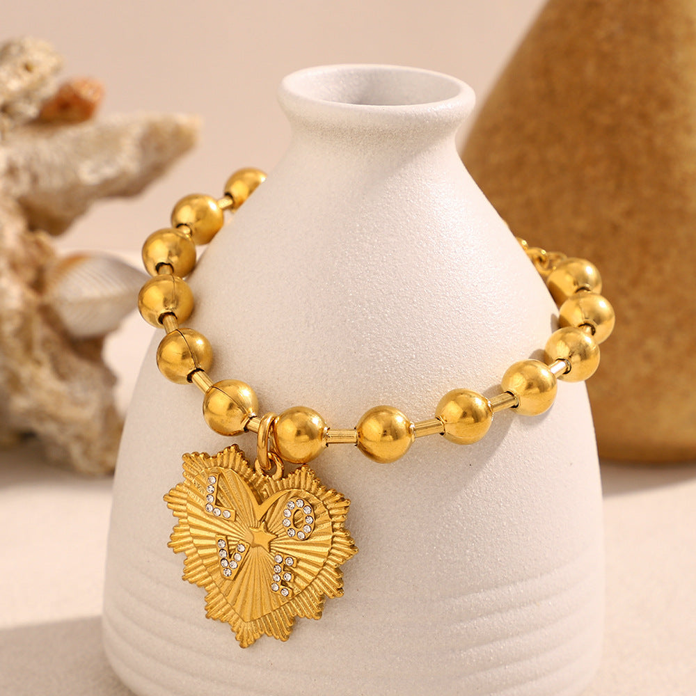 Set di collana e bracciale in acciaio inossidabile placcato oro 18 carati a forma di cuore, alla moda, da donna