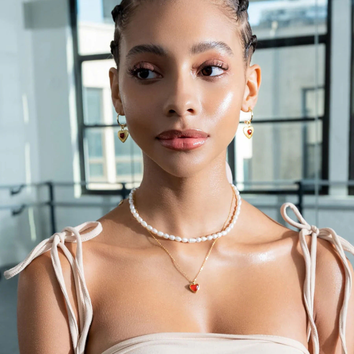 Collana alla moda in acciaio inossidabile placcato oro 18 carati a forma di cuore con ciondolo in agata rossa e perla da donna