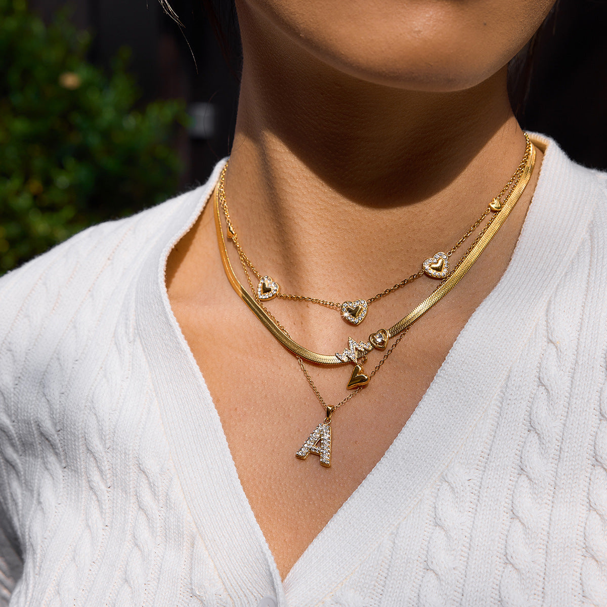 Collana da donna in acciaio inossidabile con ciondolo a cuore minimalista e finitura placcata oro