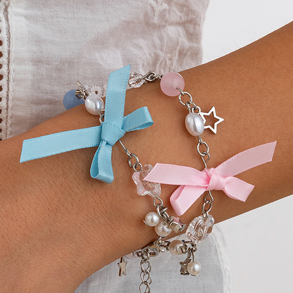 Pulsera minimalista dulce con mariposa, lazo, borla, estrella y corazón para mujer con perla de imitación y acabado chapado