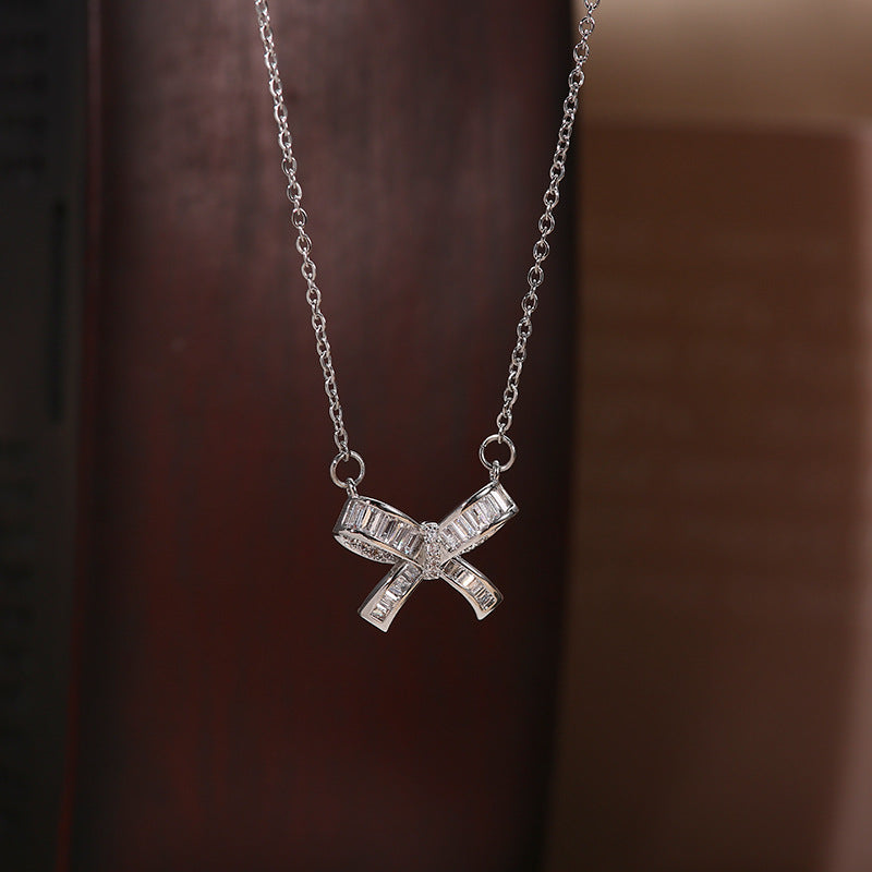 Minimalist Bow-Shaped Titanium Steel Plated Clavicle Necklace with Micro-Pave Zirconia for Women and Men