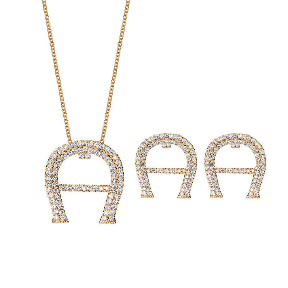 Set di Collana e Orecchini con Ciondolo a Goccia a Cuore Minimalista di Lusso in Acciaio al Titanio con Intarsi di Strass e Placcatura in Oro su Catena a O