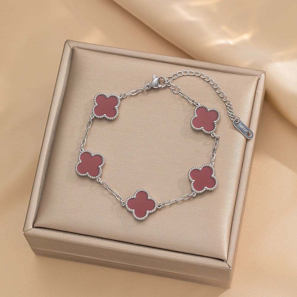 Set di collana, bracciale e orecchini a lobo da donna in acciaio al titanio minimalista con quadrifoglio fortunato