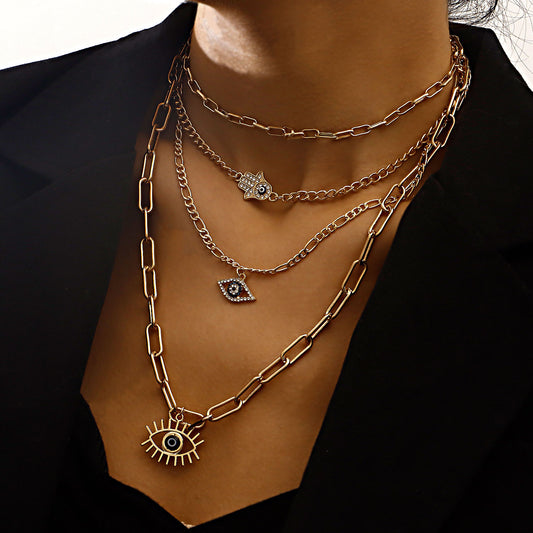 Collana da donna vintage a più strati a forma di giunzione di bambù con pendente a occhio di Allah, intarsi in strass e lega placcata oro