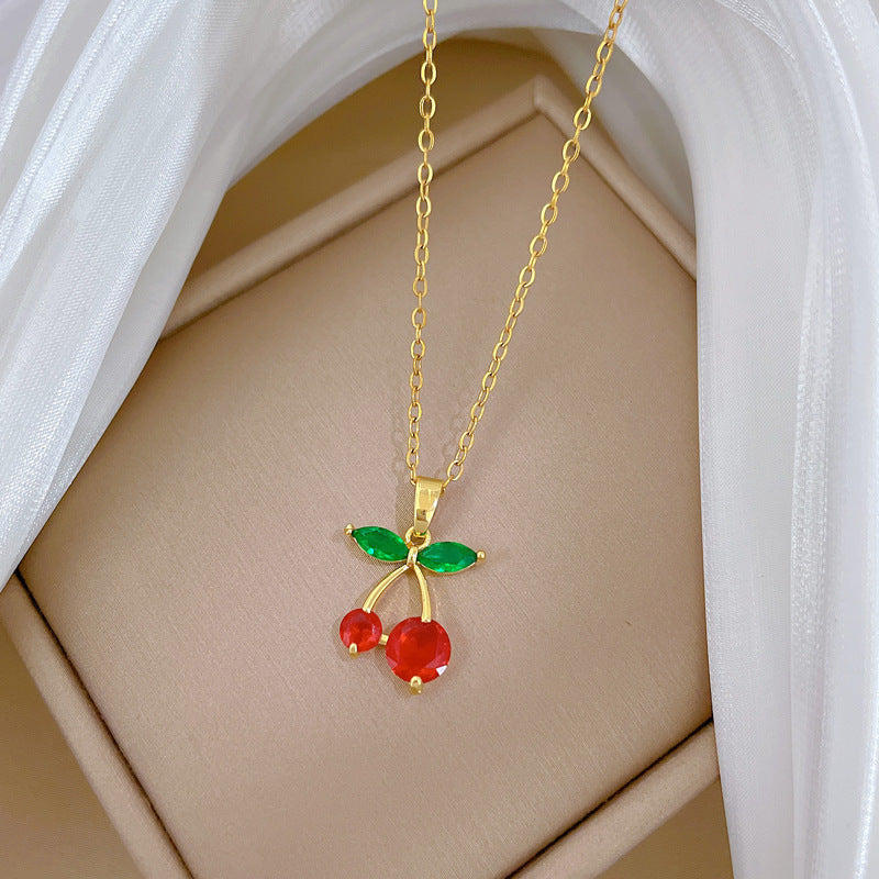 Collar con colgante de cereza de dibujos animados para mujer, de acero inoxidable con incrustaciones de diamantes de imitación y delicada cadena de clavícula