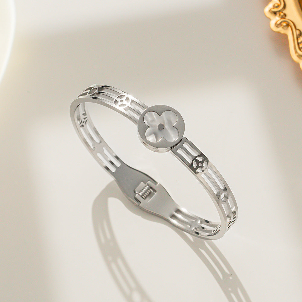 Luxury Style Four-Leaf Clover Shaped Titanium Steel Bracelet with Hollow-Out Design and White Shell Inlay for Women