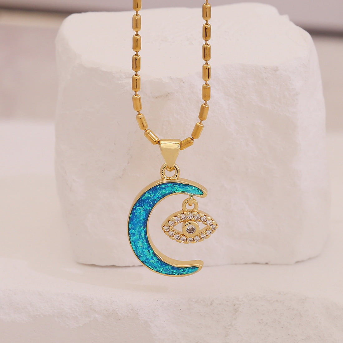 Collana pendente minimalista a stella e luna con rame placcato oro rosa, occhio d'angelo e design a rosa floreale