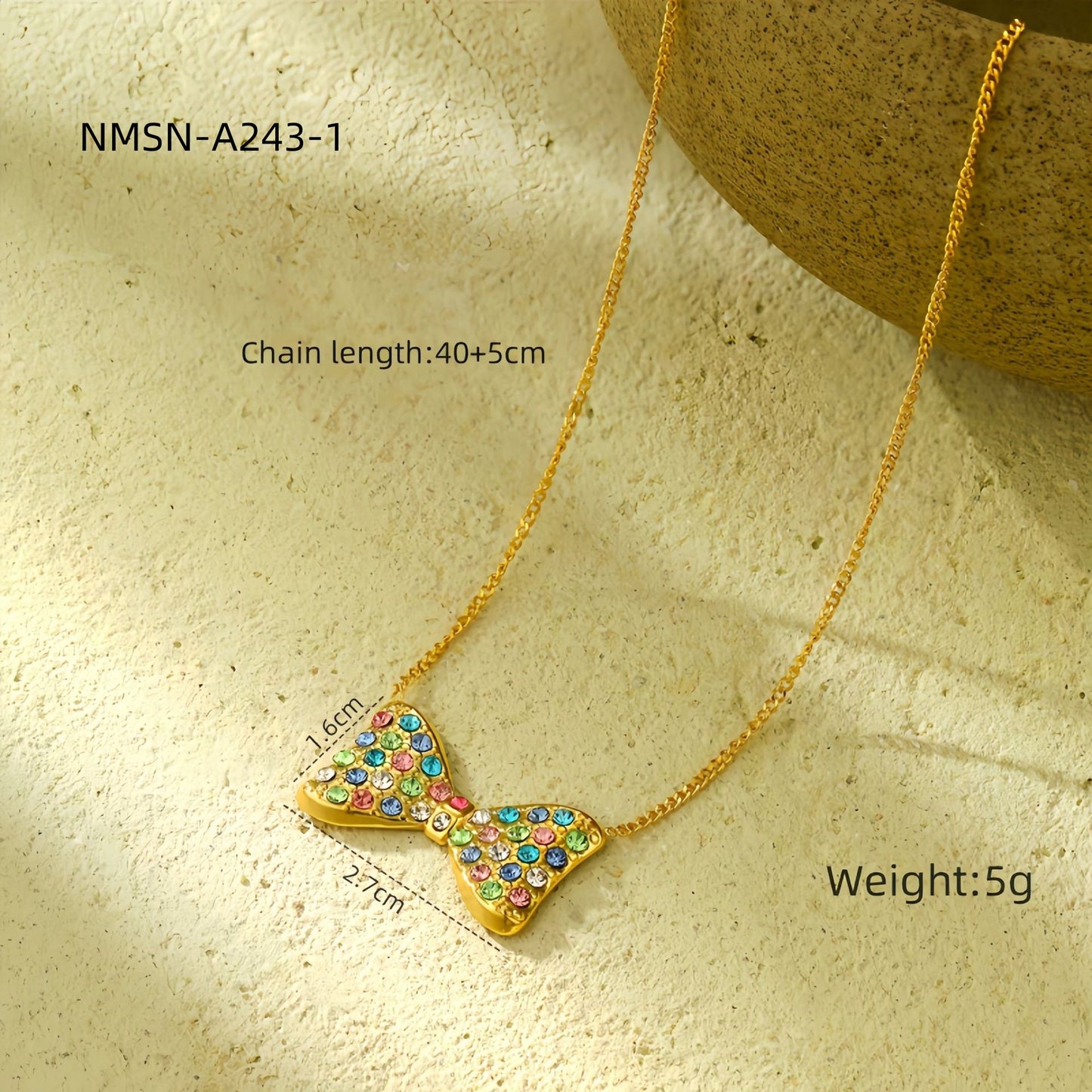 Elegante conjunto de pendientes y collar con forma de lazo de acero de titanio con incrustaciones de pedrería colorida para mujer