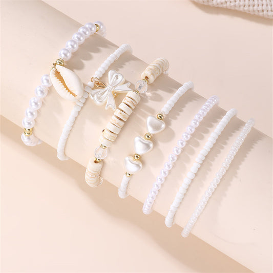 Braccialetto in stile bohémien minimalista con perle finte a forma di cuore e stella in argilla polimerica bianca per bambini
