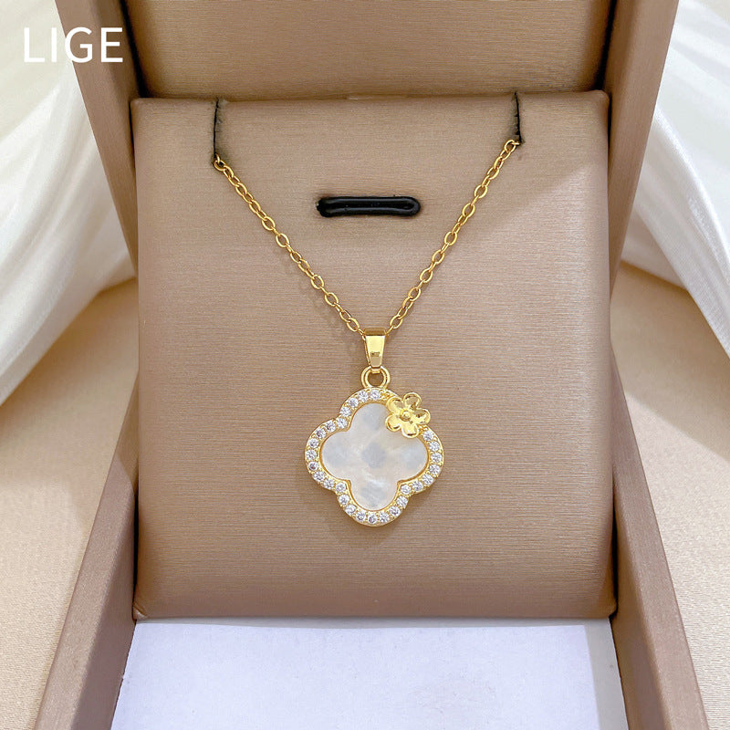 Set di collana e orecchini di lusso in acciaio al titanio geometrico con strass per donna