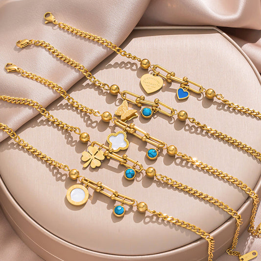 Geometric Stainless Steel Plated 18K Gold Butterfly-Shaped Bracelet with Turquoise Inlay and Horseshoe Clasp