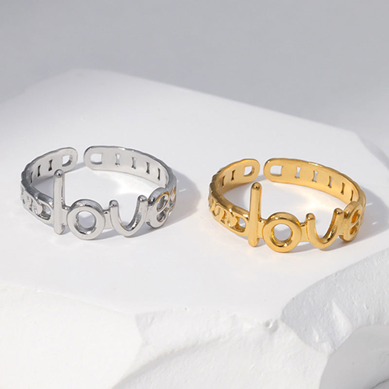 Anello aperto regolabile in acciaio al titanio con placcatura, per donna, con design a lettera d'amore minimalista
