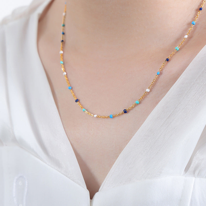 Conjunto minimalista de collar y pulsera de cadena con eslabones O de acero de titanio y detalles de esmalte para mujer