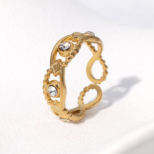 Anillo de acero inoxidable chapado en oro con diamantes de imitación en forma de ojo, estilo abierto, elegante y minimalista para mujer