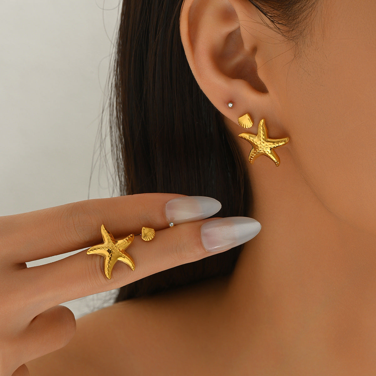 Orecchini a perno di lusso con stelle marine geometriche e conchiglie con intarsio in strass da donna