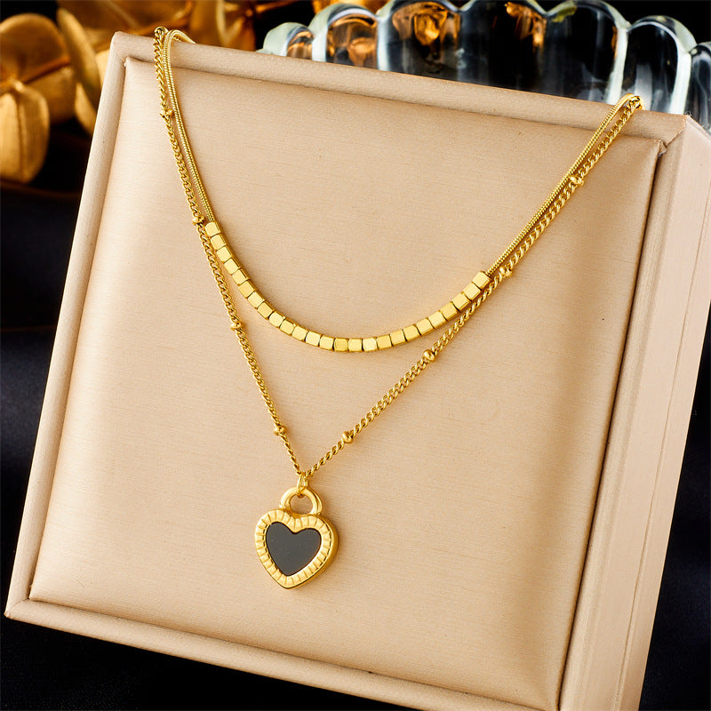 Minimalist Fashion Heart-Shaped Gold-Plated Titanium Steel Double-Layer Necklace with Black and White Heart Pendant