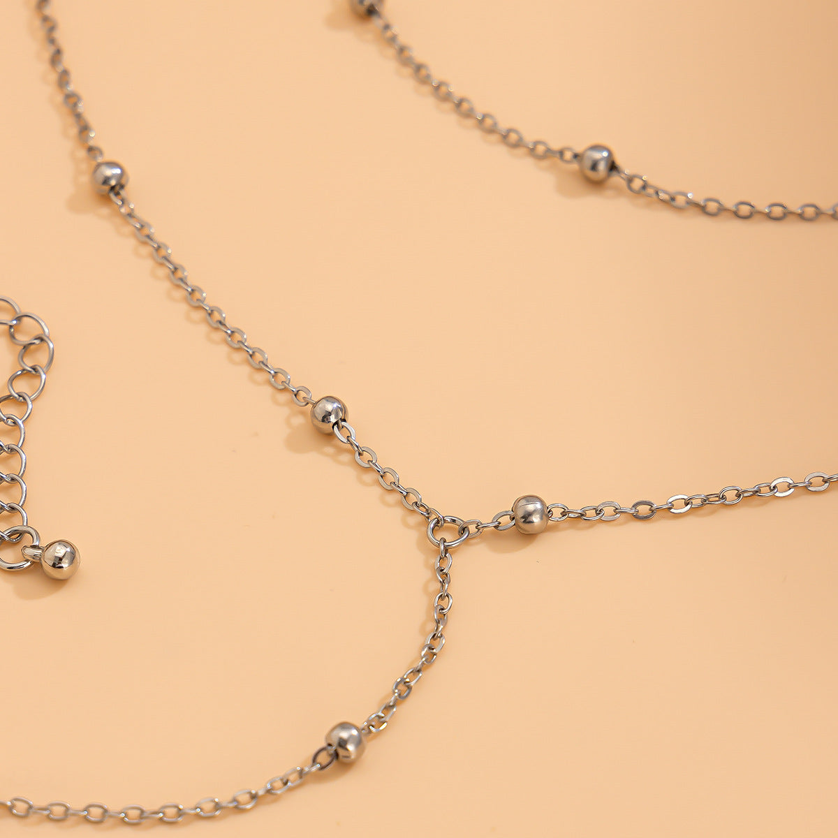 Set collana con ciondolo a sfera con nappa geometrica minimalista con catena in rame placcato e bracciale lungo a strati
