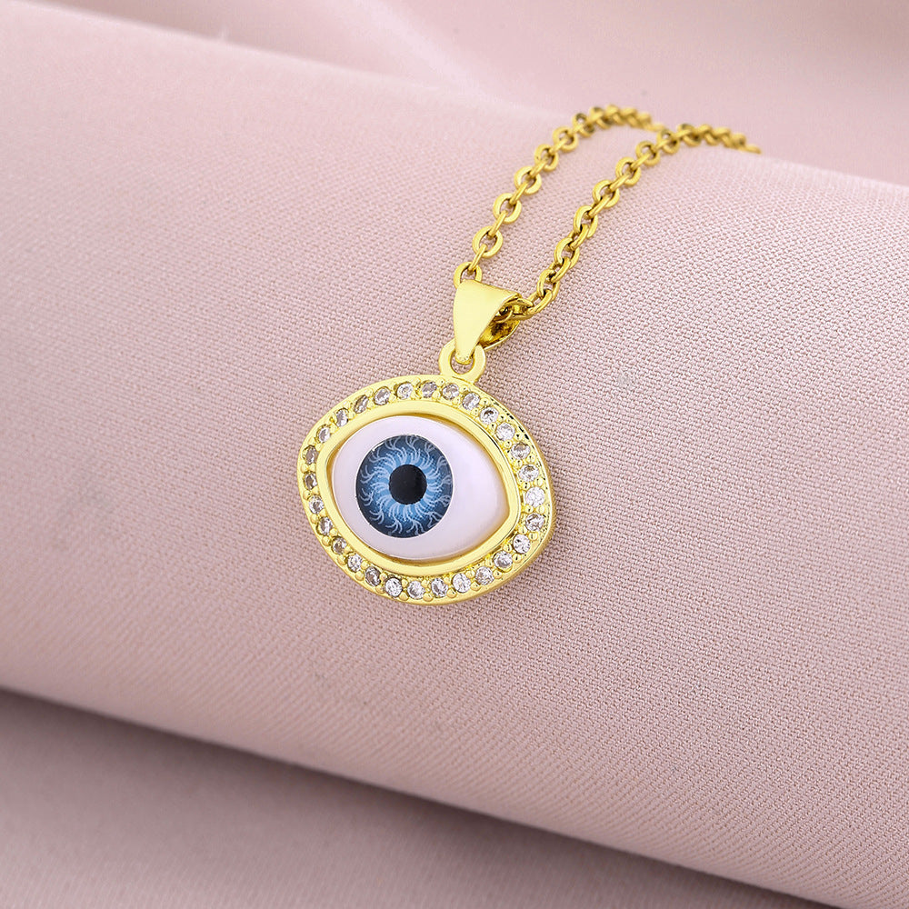 Elegante Collar con Colgante en Forma de Ojo para Mujer de Cobre con Baño de Oro de 18K y Circonitas Micro-Pavé en Cadena de Acero de Titanio