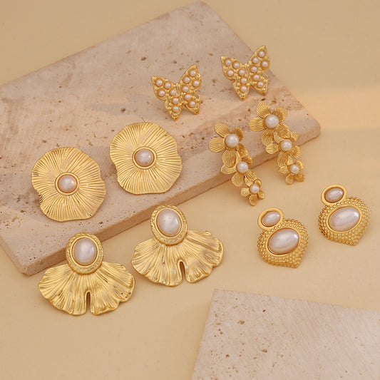 Pendientes de acero inoxidable estilo OL con diseño de corazón y flores
