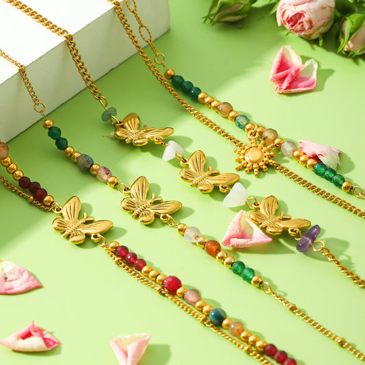 Elegante bracciale da donna con farfalla in stile francese e perline, in acciaio inossidabile con finitura placcata