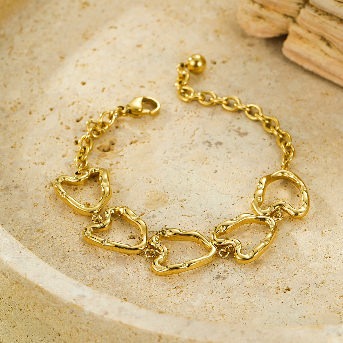 Minimalist Cool-Tone Irregular Hollow Heart OT Clasp Bracelet for Women Stainless Steel Plated Bracelet for Daily Wear and Office Use