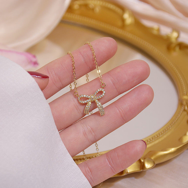 Sweet Minimalist Bow-Shaped Titanium Steel Necklace with Rhinestone Inlay for Women and Men, Delicate Clavicle Chain