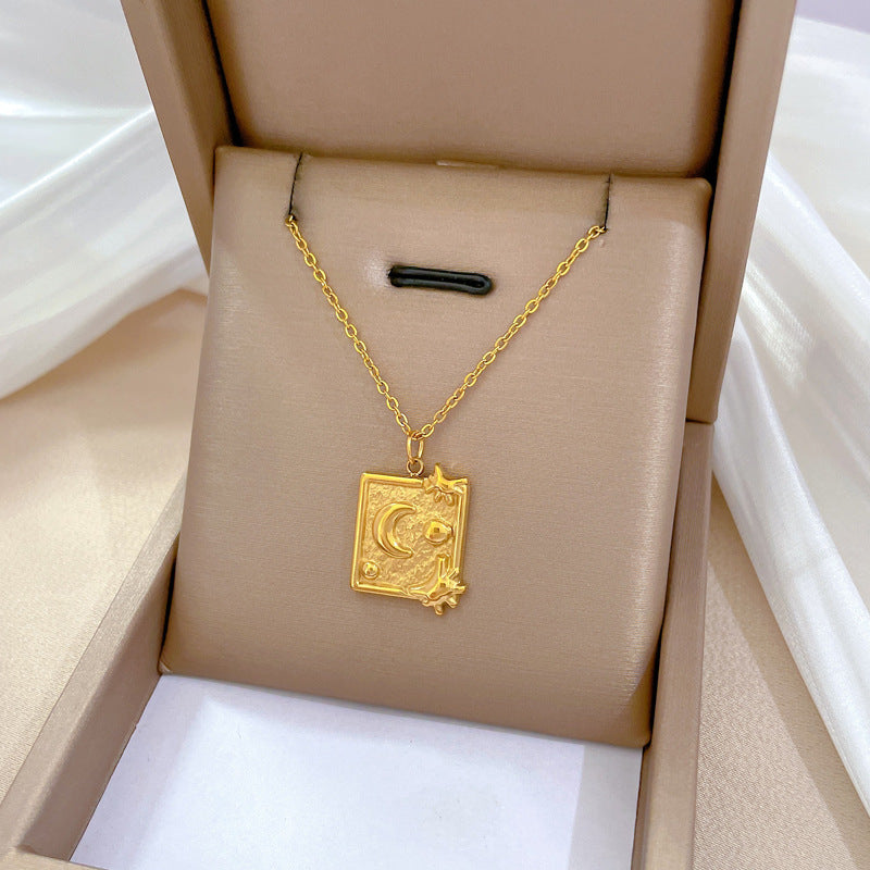 Collar colgante geométrico de titanio y acero minimalista vintage para mujeres y hombres con acabado chapado en oro y cadena de medallón con motivo floral