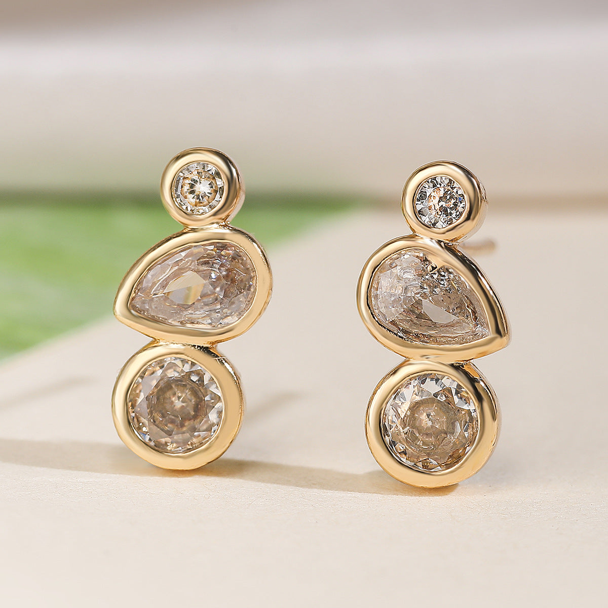 Geometric Asymmetrical Zircon Stud Earrings for Women Made of Copper with Real Gold Plating and Micro-Pavé Setting