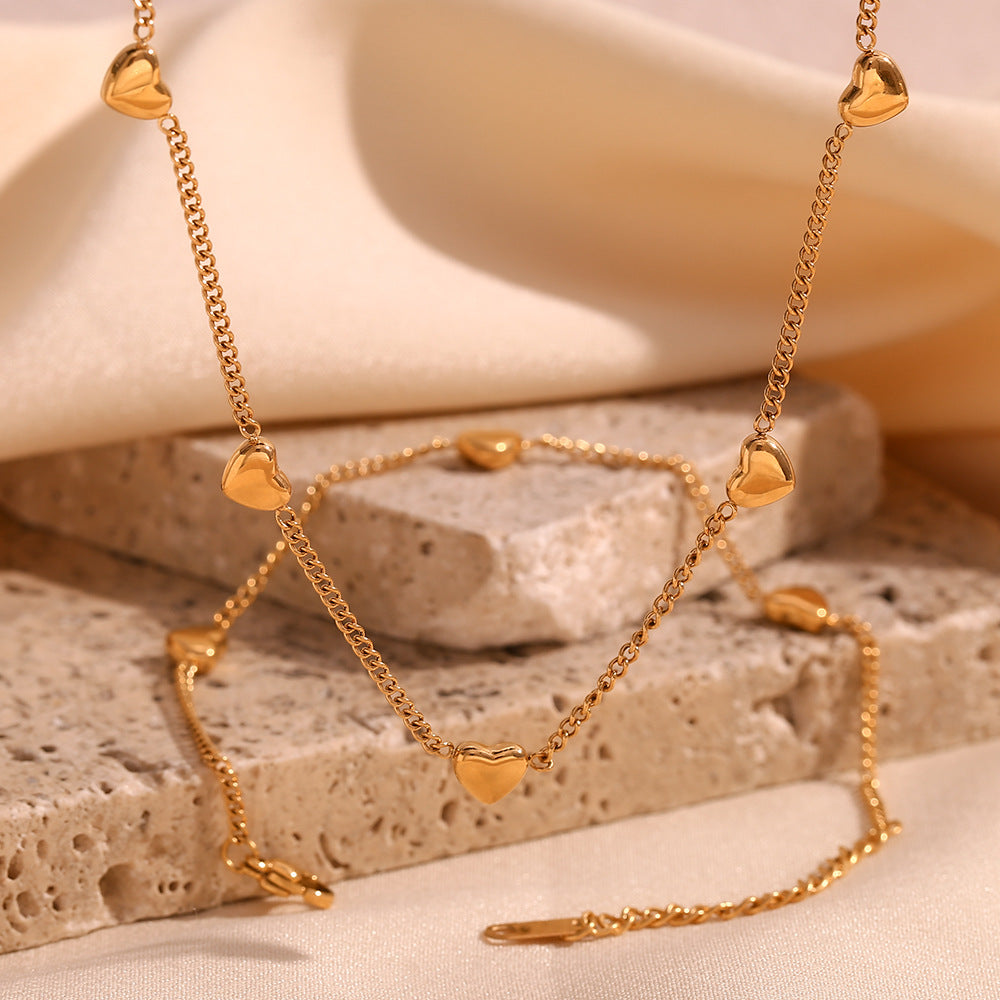 Moderno juego de pulsera y collar de acero inoxidable con forma de corazón chapado en oro de 18 quilates para mujer