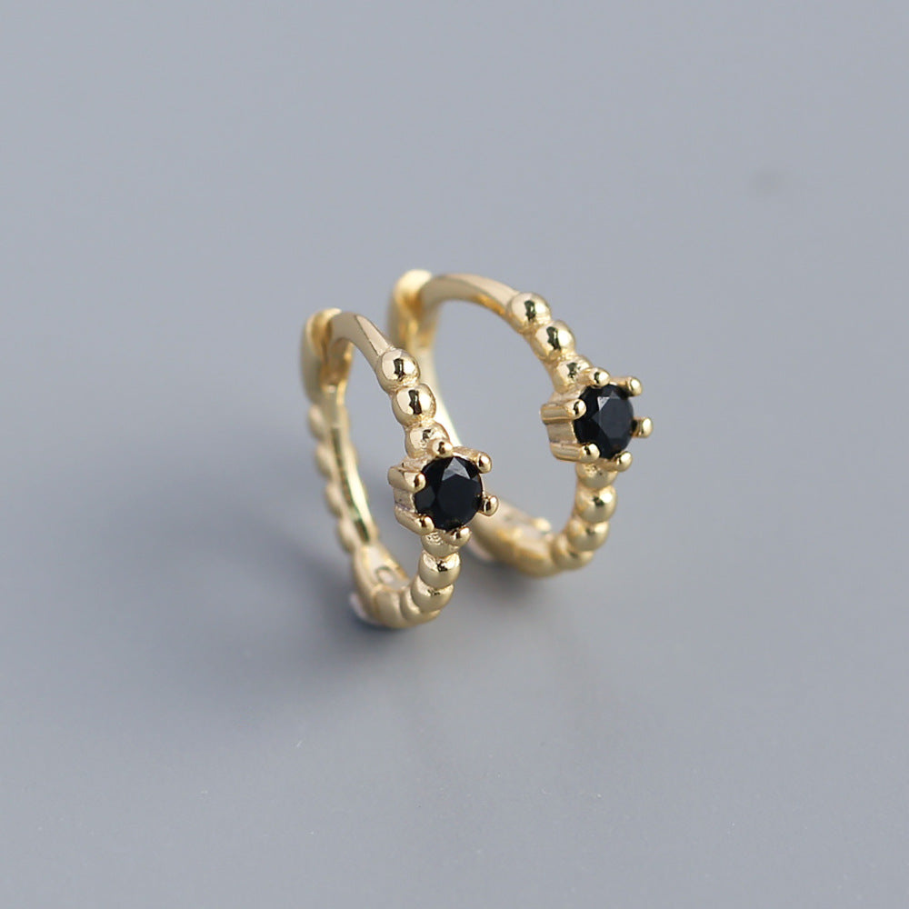 Orecchini a perno tondi con intarsi di diamanti in argento sterling 925