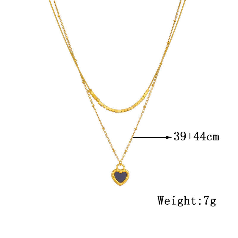 Minimalist Fashion Heart-Shaped Gold-Plated Titanium Steel Double-Layer Necklace with Black and White Heart Pendant
