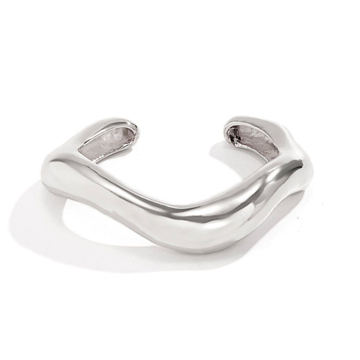 Bracciale rigido a molla in metallo placcato lucido a goccia geometrica di moda da donna