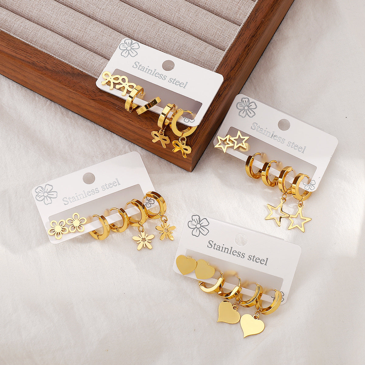 Minimalist Stainless Steel Star Heart Floral Hoop Earrings with Hollow Design and Plated Finish