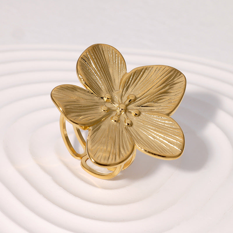 Elegante anello aperto a motivo floreale in acciaio inossidabile placcato oro da donna